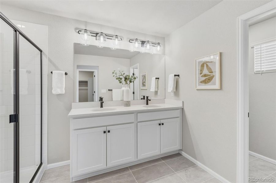 Furnished interior view inside a new home in Woodrose at Painted Prairie, Aurora (Image 5).