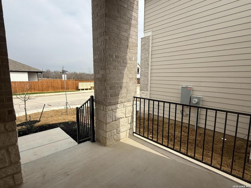 Exterior details and patio area of a home in Hennersby Hollow, San Antonio (Image 22).