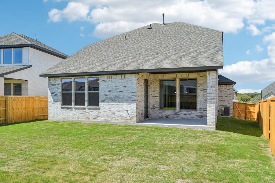 Exterior details and patio area of a home in 6 Creeks, Kyle (Image 4).