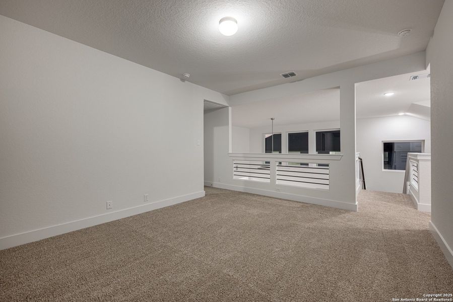 Spacious, unfurnished interior of a new home in Buffalo Crossing – New Phase Now Preselling, Cibolo (Image 22).