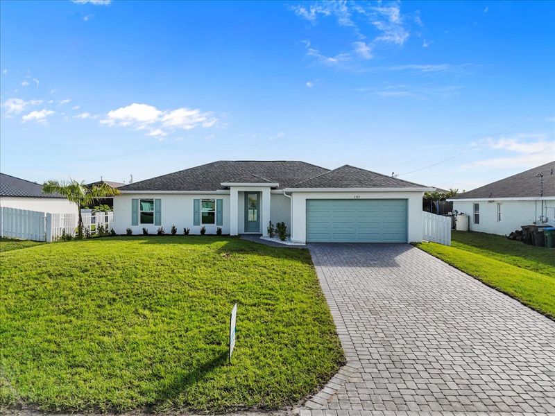 Representative exterior details of a home built from the The Sunset Harbor by Sunlife Homes LLC in Cape Coral, Cape Coral (Image 24). Representative exterior details of a home built from the The Sunset Harbor by Sunlife Homes LLC in Cape Coral, Cape Coral (Image 24).