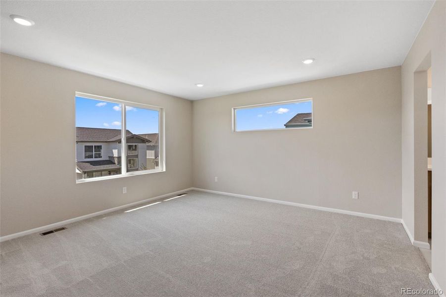 Spacious, unfurnished interior of a new home in Woodrose at Painted Prairie, Aurora (Image 18).