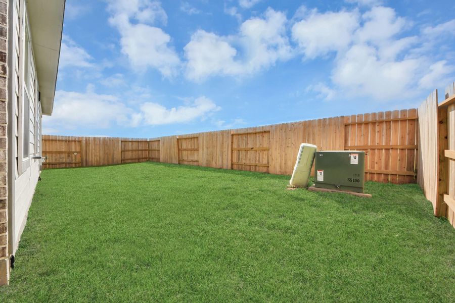 Backyard retreat, offering an abundance of space for kids to play and explore. The possibilities are endless in this outdoor haven, where the joy of open-air activities and family gatherings awaits.