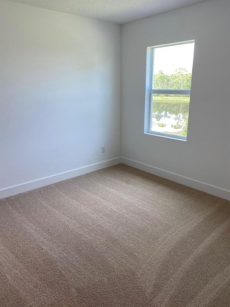 Spacious, unfurnished interior of a new home in Preserves at Park Trace, Stuart (Image 9).