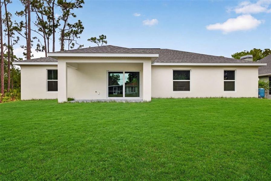 Exterior details and patio area of a home in , Port Charlotte (Image 14).