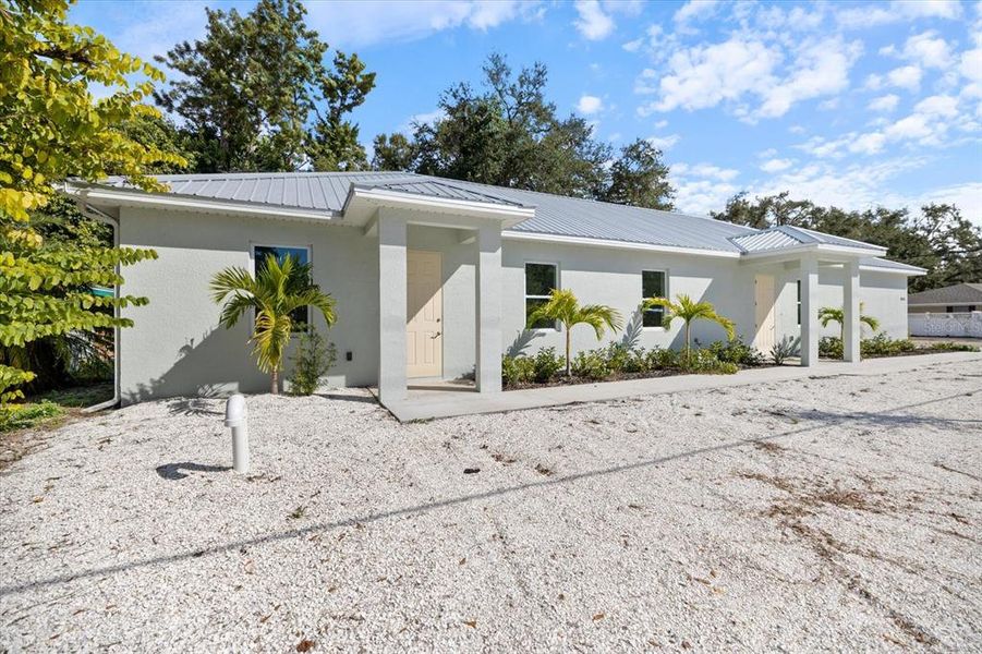 Exterior details and patio area of a home in , Sarasota (Image 3).