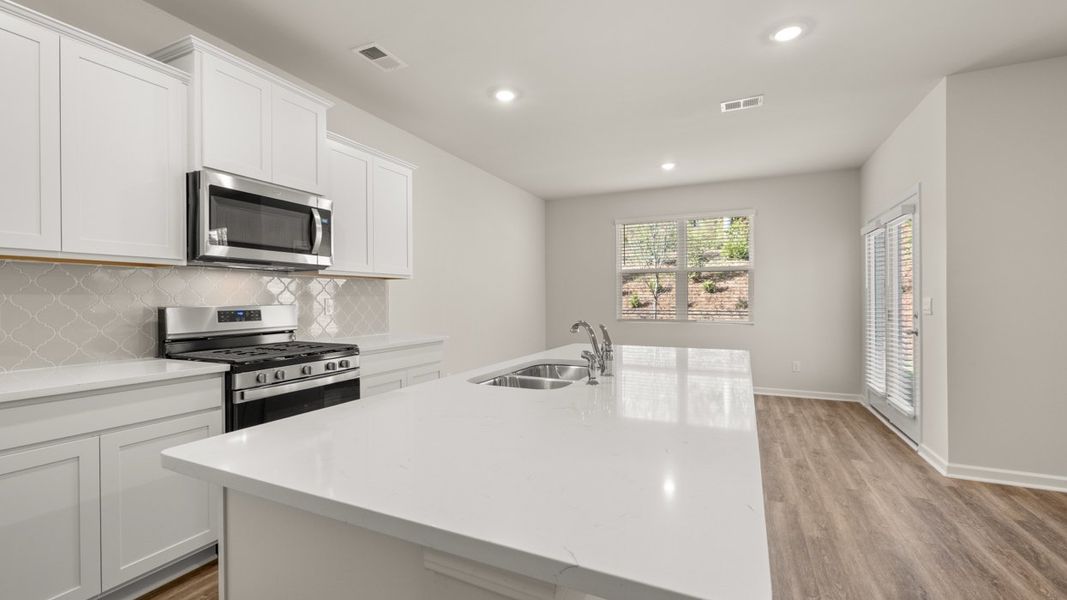 Representative furnished interior of a home built from the Darwin by D.R. Horton in Poplar Preserve, Newnan (Image 5).