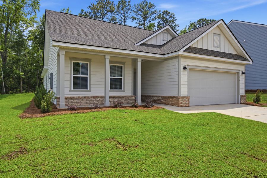 Front exterior of a new home in Carriage Estates, Lexington, SC, highlighting curb appeal (Image 18). Front exterior of a new home in Carriage Estates, Lexington, SC, highlighting curb appeal (Image 18).
