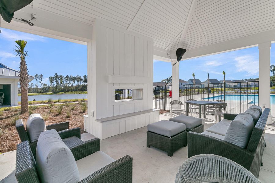 Exterior details and patio area of a home in Summerwind Crossing at Lakes of Cane Bay, Summerville (Image 29).
