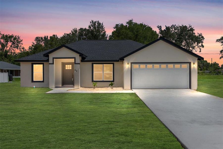 Front exterior of a new home in , Ocala, FL, highlighting curb appeal (Image 41). Front exterior of a new home in , Ocala, FL, highlighting curb appeal (Image 41).