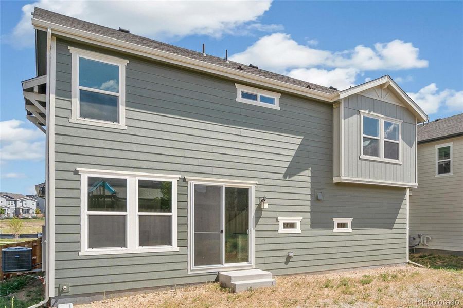 Exterior details and patio area of a home in Turnberry, Commerce City (Image 3).