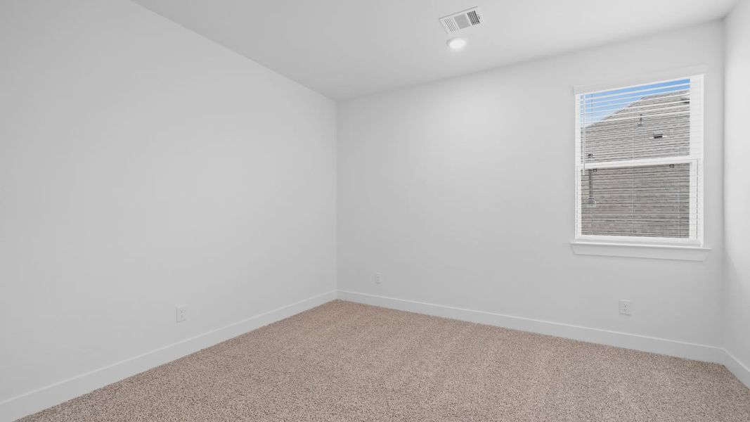 Spacious, unfurnished interior of a new home in Lakes of Cane Island, Katy (Image 26).