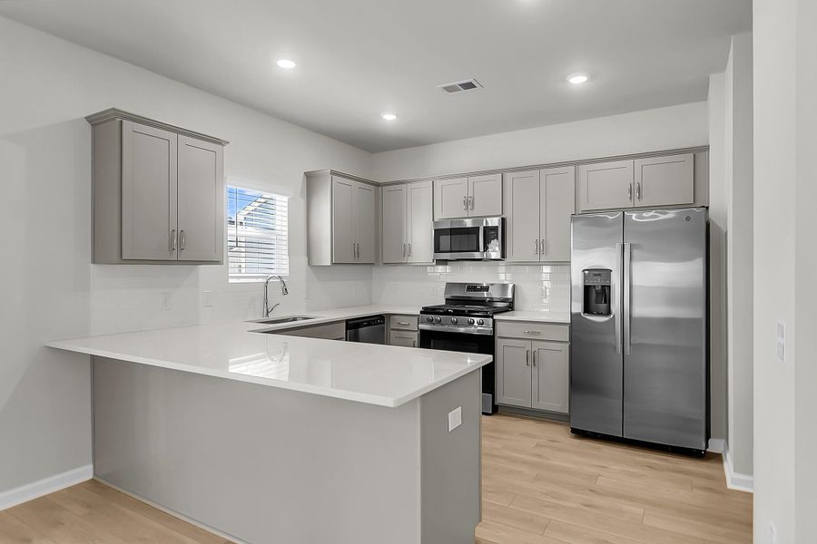Furnished interior view inside a new home in Six Oaks, Summerville (Image 11).