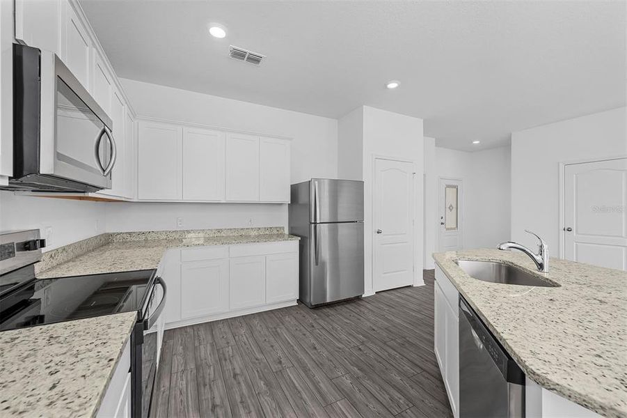 Furnished interior view inside a new home in , Poinciana (Image 4).