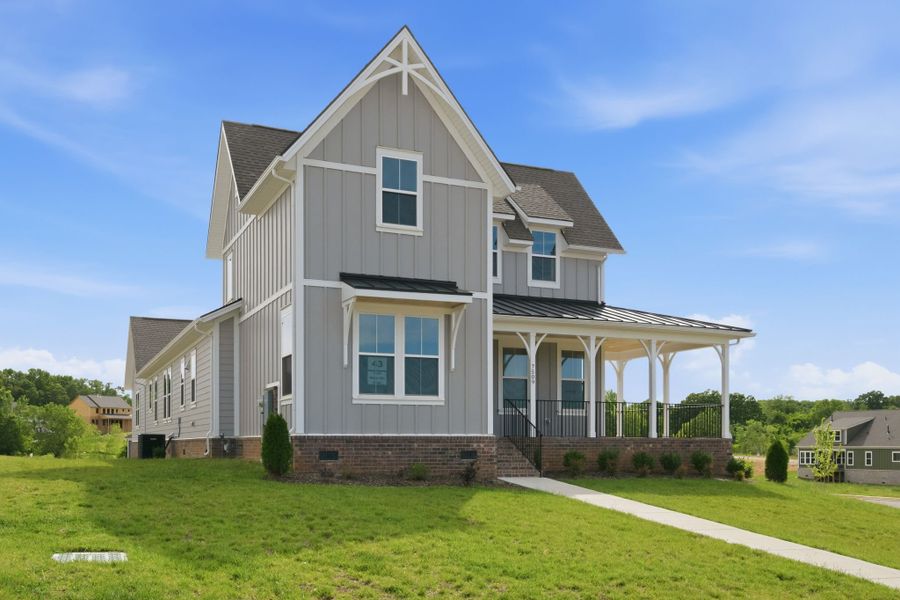 Front exterior of a new home in Richvale Estates, Fairview, TN, highlighting curb appeal (Image 26). Front exterior of a new home in Richvale Estates, Fairview, TN, highlighting curb appeal (Image 26).