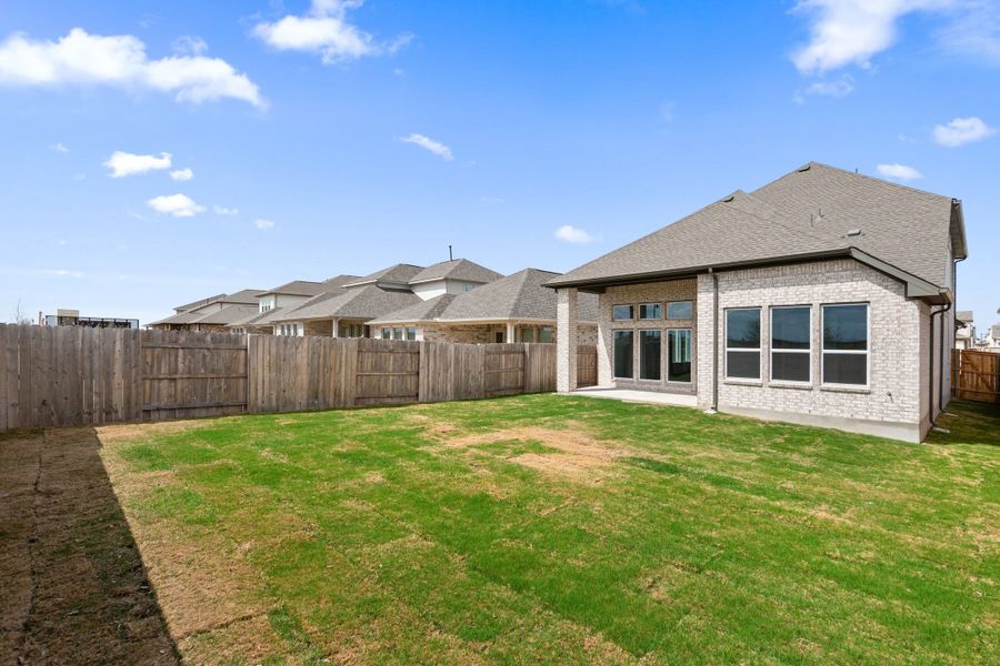 Exterior details and patio area of a home in Flora, Hutto (Image 28).