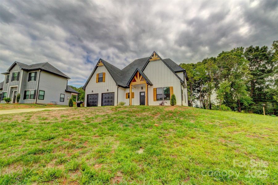 Front exterior of a new home in , Shelby, NC, highlighting curb appeal (Image 2). Front exterior of a new home in , Shelby, NC, highlighting curb appeal (Image 2).