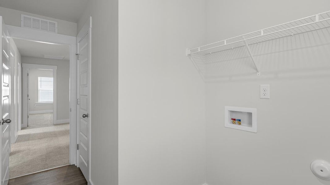 Representative unfurnished interior of a home built from the TILLMAN by D.R. Horton in The Preserve at Tidewater, Sneads Ferry (Image 45).