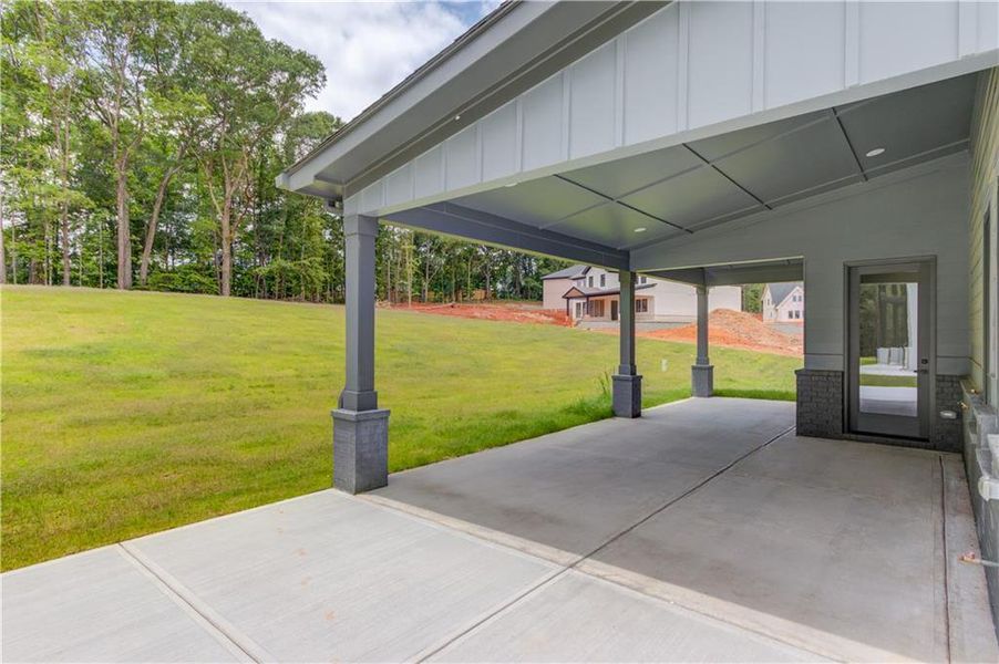 Front exterior of a new home in , Auburn, GA, highlighting curb appeal (Image 24).