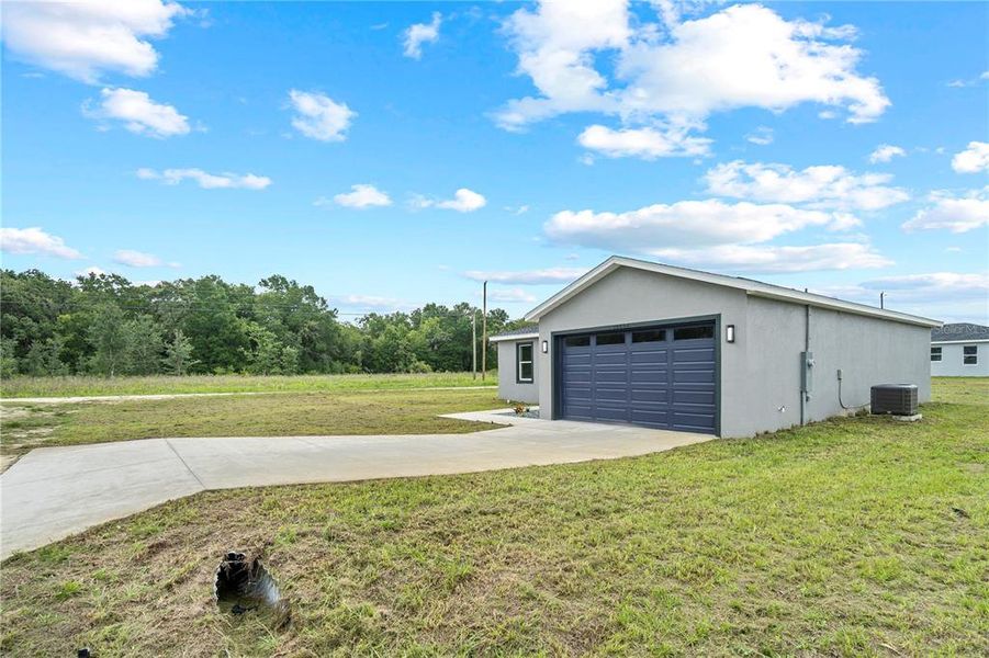 Front exterior of a new home in , Dunnellon, FL, highlighting curb appeal (Image 18).