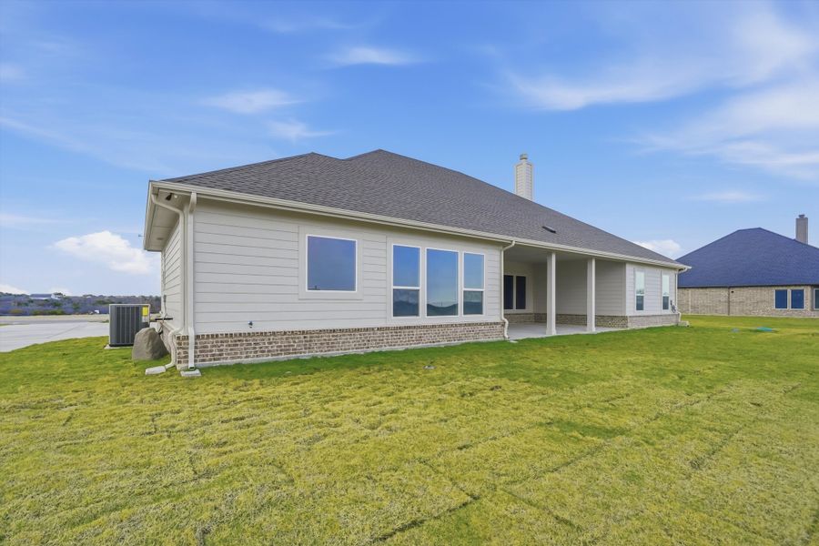 Exterior details and patio area of a home in Eagle Ridge Estates, Weatherford (Image 24).