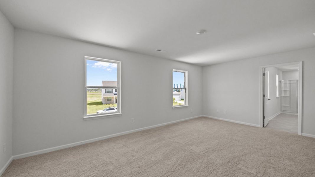 Spacious, unfurnished interior of a new home in East Ridge, Ayden (Image 26).