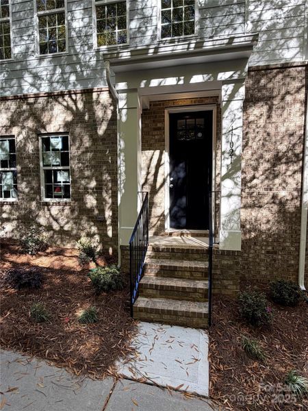 Exterior details and patio area of a home in Vanguard at Vermillion, Huntersville (Image 16).