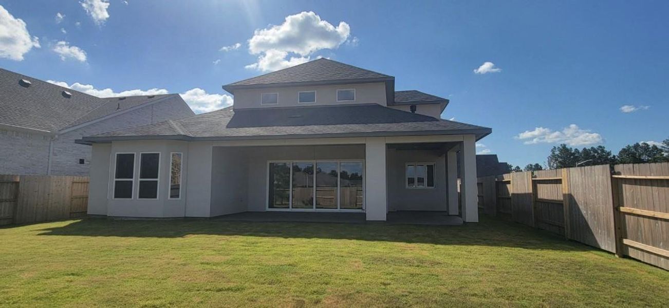 Exterior details and patio area of a home in WILDTREE 60', Montgomery (Image 4).