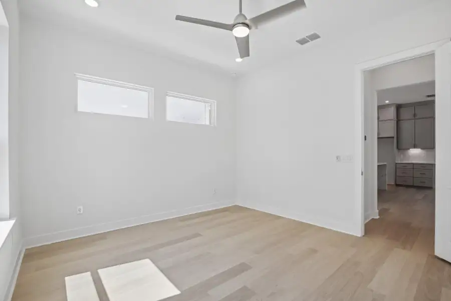 Spacious, unfurnished interior of a new home in Saddle Ridge at Wildhorse Ranch, Manor (Image 17).