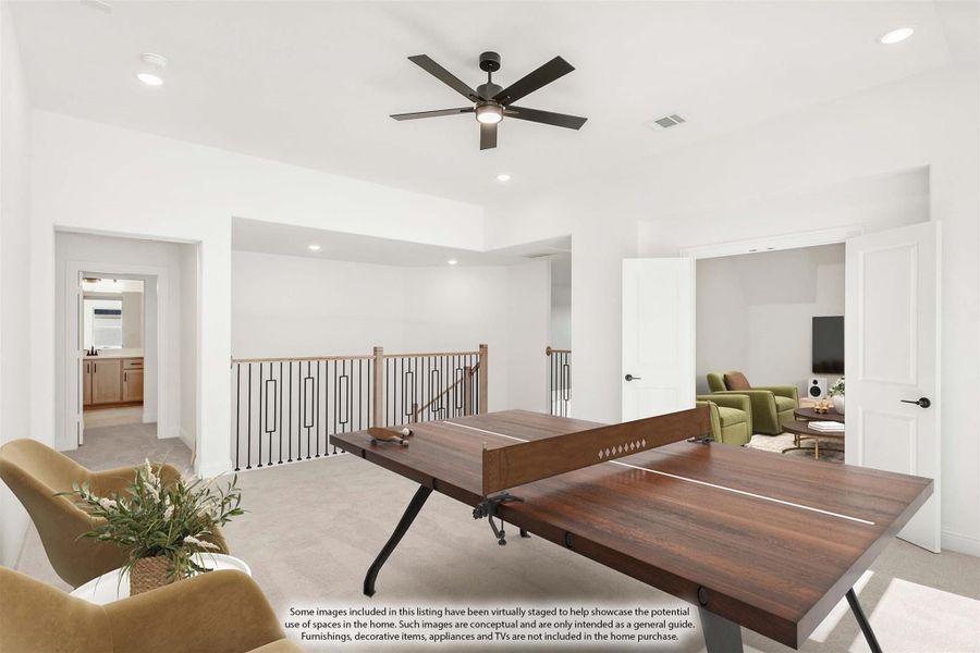 Upstairs loft game room with ping pong table, ceiling fan, open railing, and views into adjacent rooms