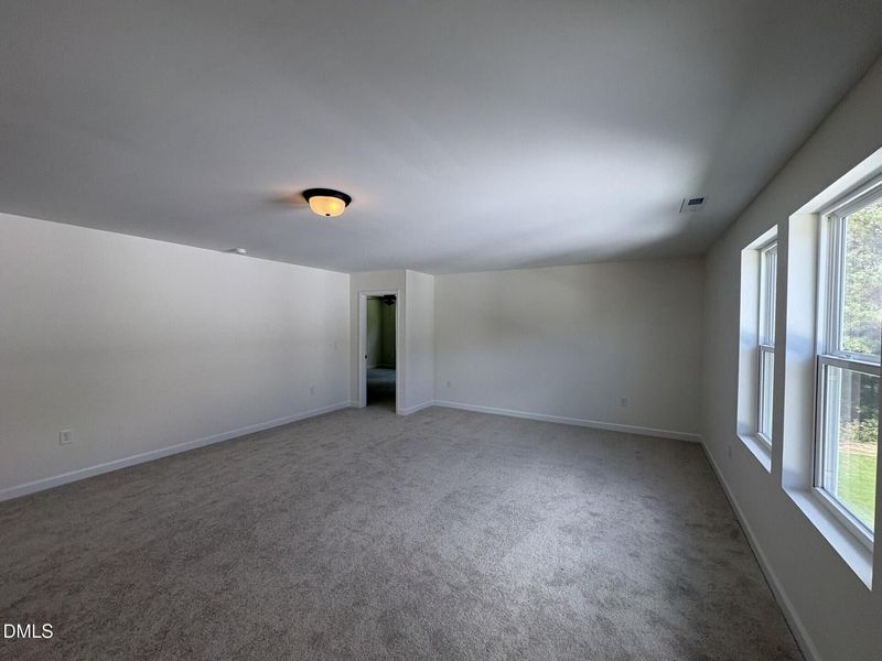 Spacious, unfurnished interior of a new home in Woodland Crossing, Zebulon (Image 34).