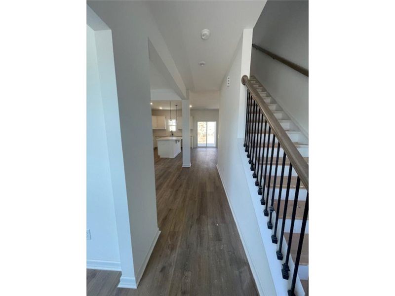 The inviting entryway features a bright open-conce