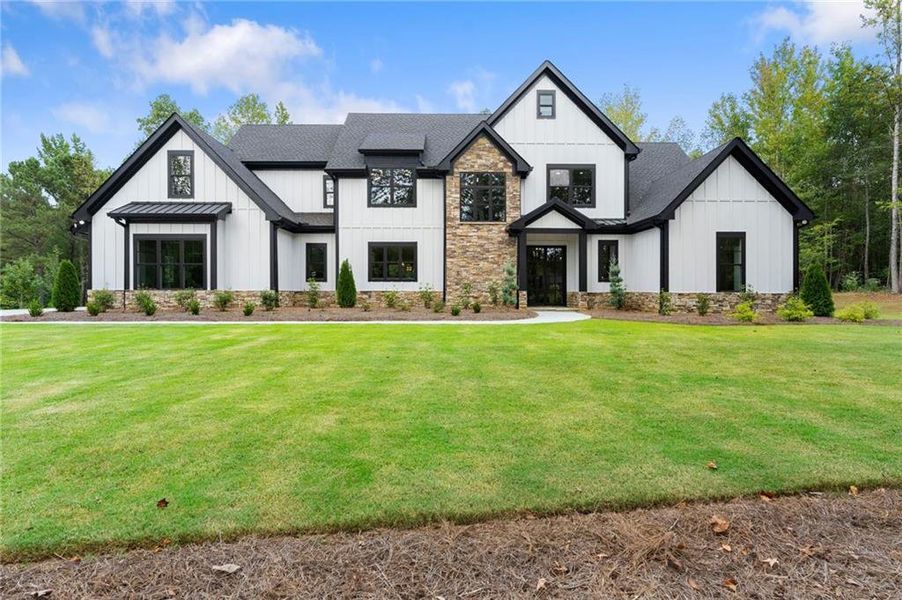 Front exterior of a new home in , Ball Ground, GA, highlighting curb appeal (Image 27).