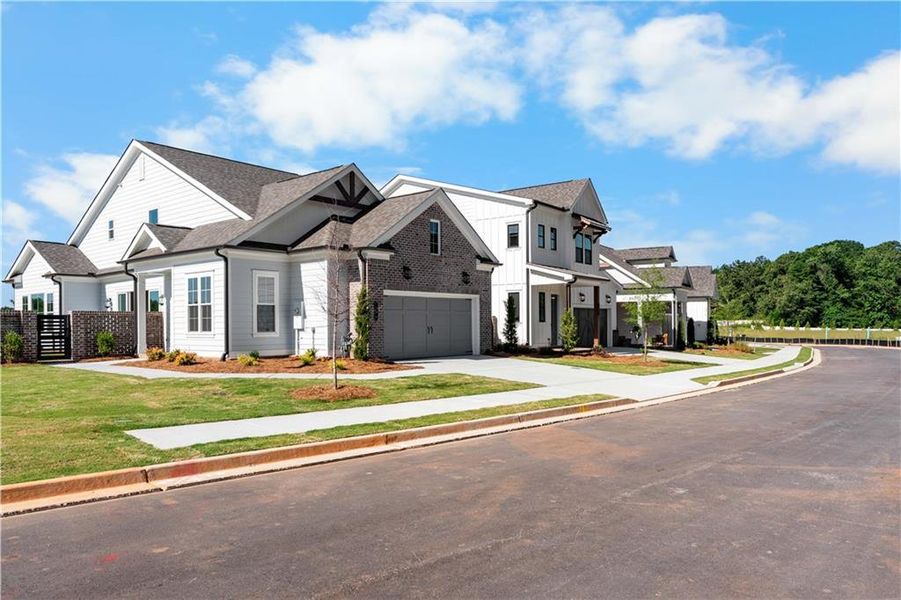 Front exterior of a new home in Aberdeen, Hoschton, GA, highlighting curb appeal (Image 22). Front exterior of a new home in Aberdeen, Hoschton, GA, highlighting curb appeal (Image 22).