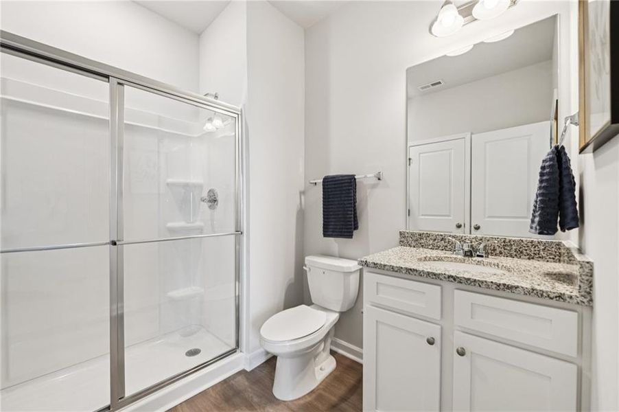 Furnished interior view inside a new home in The Hills at Cedar Creek, Winder (Image 19).