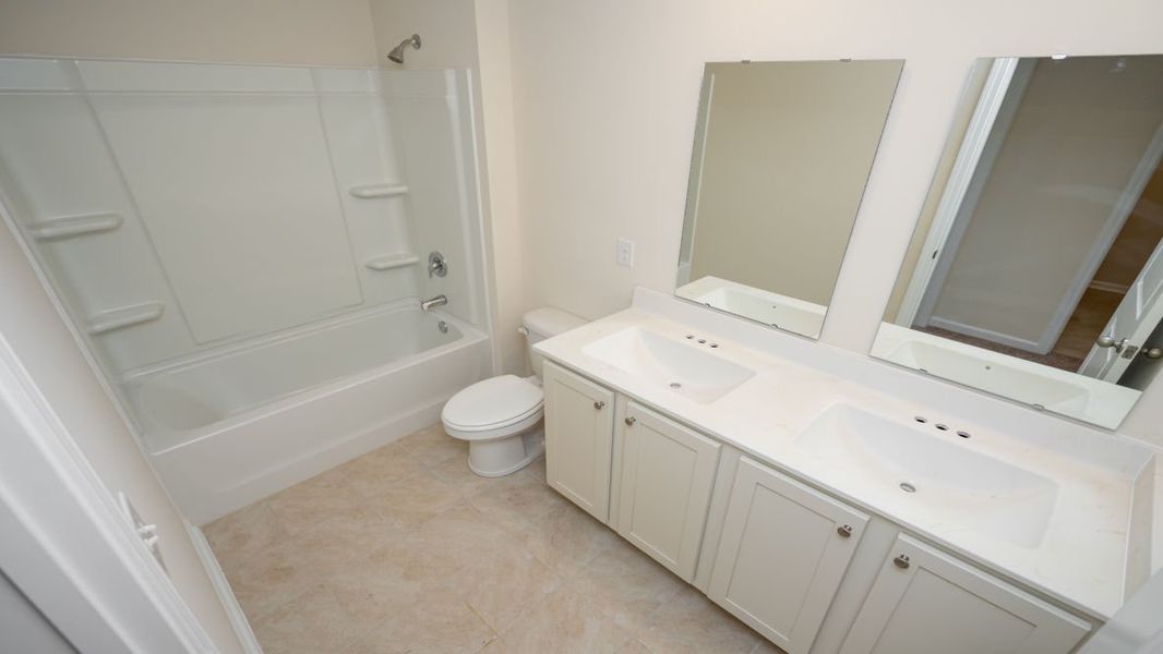Furnished interior view inside a new home in The Pines at Blake Farm, Wilmington (Image 10).