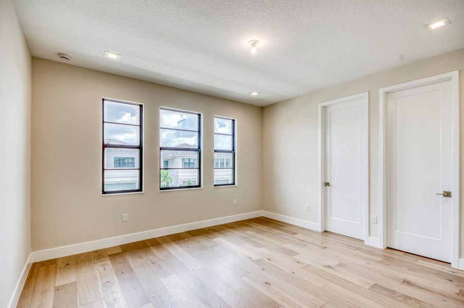 Furnished interior view inside a new home in Apex at Avenir, Palm Beach Gardens (Image 10).