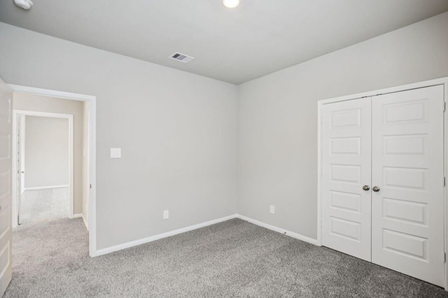 Spacious, unfurnished interior of a new home in Kemah Crossing - Luxe Series, Kemah (Image 27). Spacious, unfurnished interior of a new home in Kemah Crossing - Luxe Series, Kemah (Image 27).