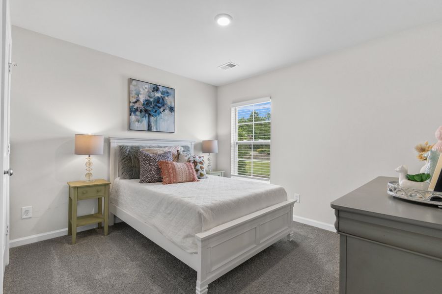 Representative furnished interior of a home built from the Spruce A by McGuinn Homes in Reserves at Mill Creek, Columbia (Image 18).