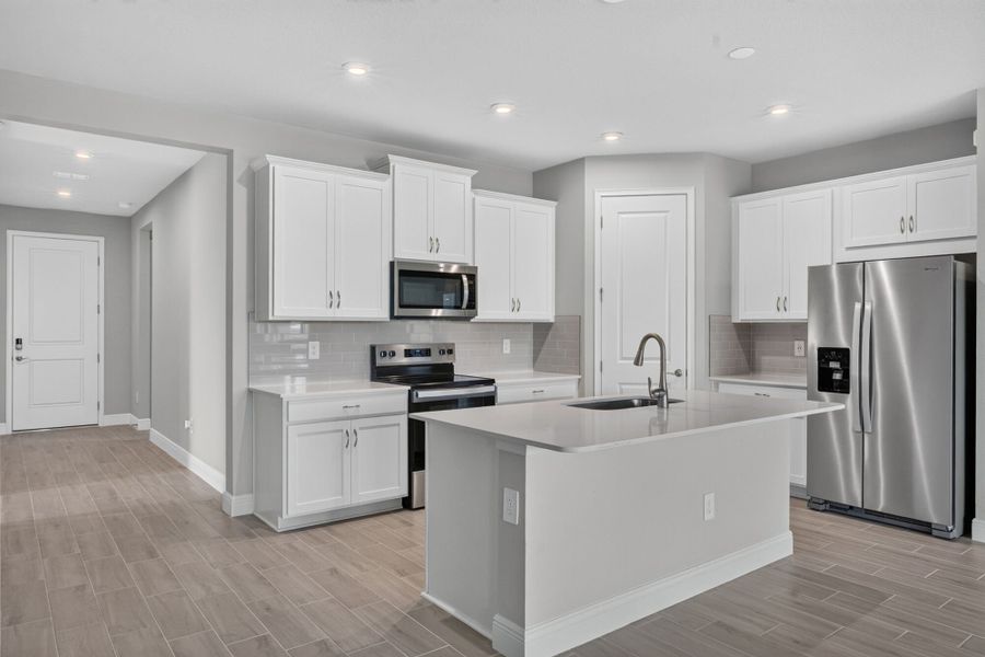 Furnished interior view inside a new home in Windwater, Parrish (Image 3).