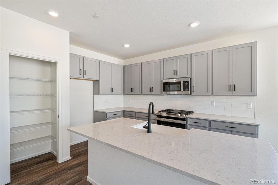 Furnished interior view inside a new home in Turnberry, Commerce City (Image 3).