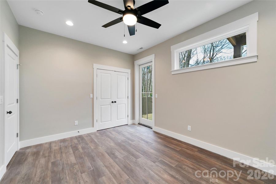 Spacious, unfurnished interior of a new home in , Pisgah Forest (Image 33).