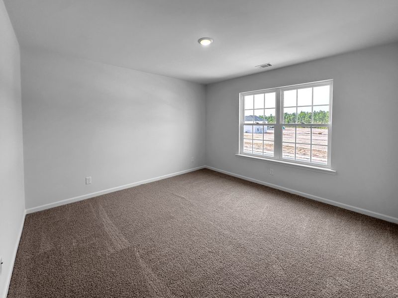 Spacious, unfurnished interior of a new home in Doctor's Creek, Ludowici (Image 18).