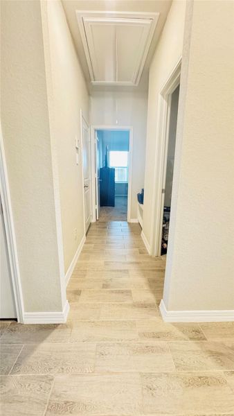 Garage entrance door on the left/laundry room to the right, bedroom 3 straigh ahead Garage entrance door on the left/laundry room to the right, bedroom 3 straigh ahead