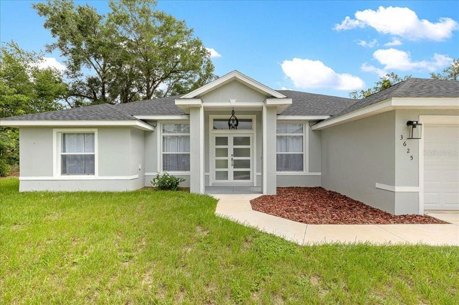 Exterior details and patio area of a home in , Summerfield (Image 21).