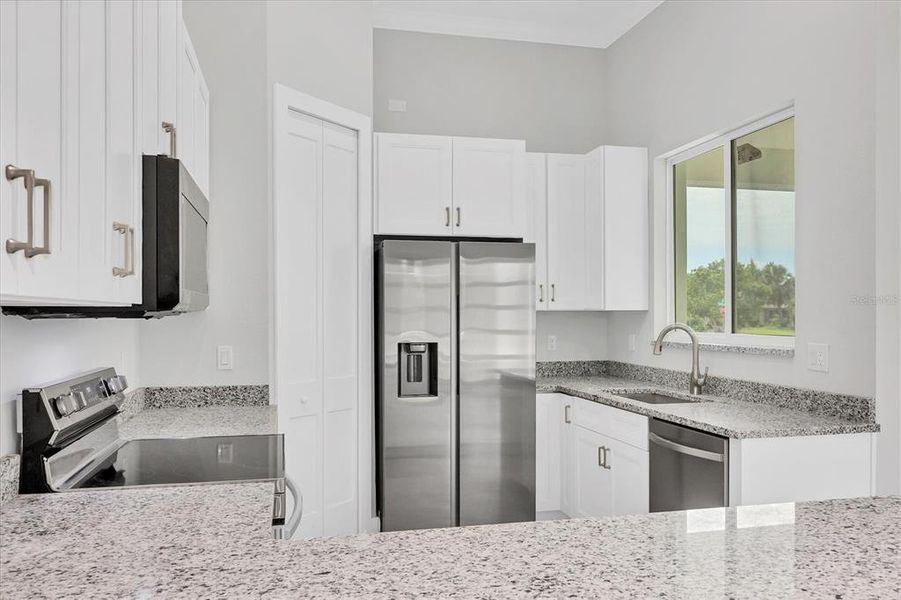 Furnished interior view inside a new home in , Port Charlotte (Image 7).