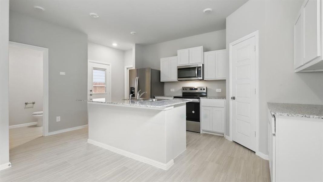 Kitchen - All Home and community information, including pricing, included features, terms, availability and amenities, are subject to change at any time without notice or obligation. All Drawings, pictures, photographs, video, square footages, floor plans, elevations, features, colors and sizes are approximate for illustration purposes only and will vary from the homes as built. Kitchen - All Home and community information, including pricing, included features, terms, availability and amenities, are subject to change at any time without notice or obligation. All Drawings, pictures, photographs, video, square footages, floor plans, elevations, features, colors and sizes are approximate for illustration purposes only and will vary from the homes as built.