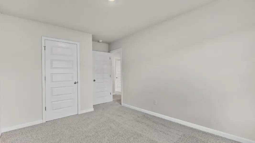 Representative unfurnished interior of a home built from the Ansley by D.R. Horton in Walden Ridge, Macon (Image 31).
