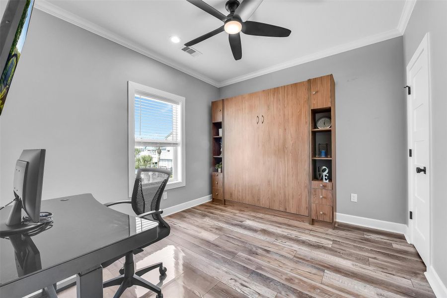 Third bedroom with murphy bed makes this room versatile