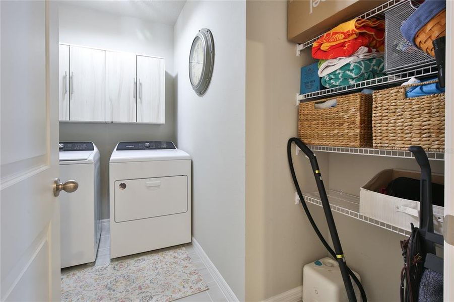 Private Laundry Room w/Storage Shelving